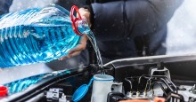 Topping off vehicle fluids. Photo ID 166202754 © Lemusique | Dreamstime.com